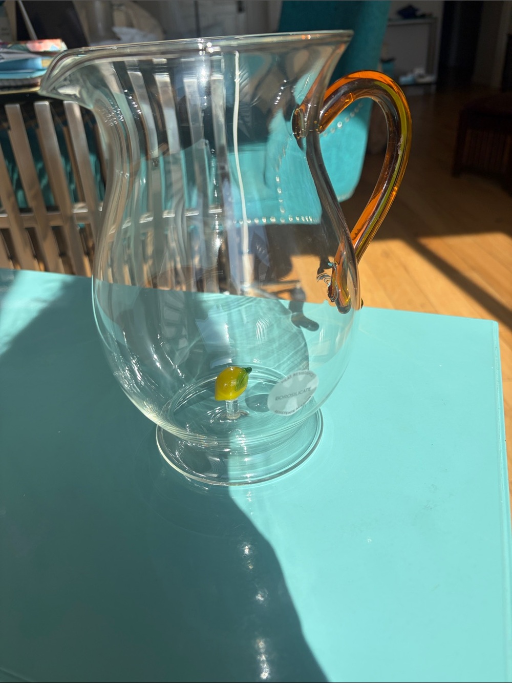 Zara Home Clear Glass Pitcher with Amber Handle And Lemon at bottom